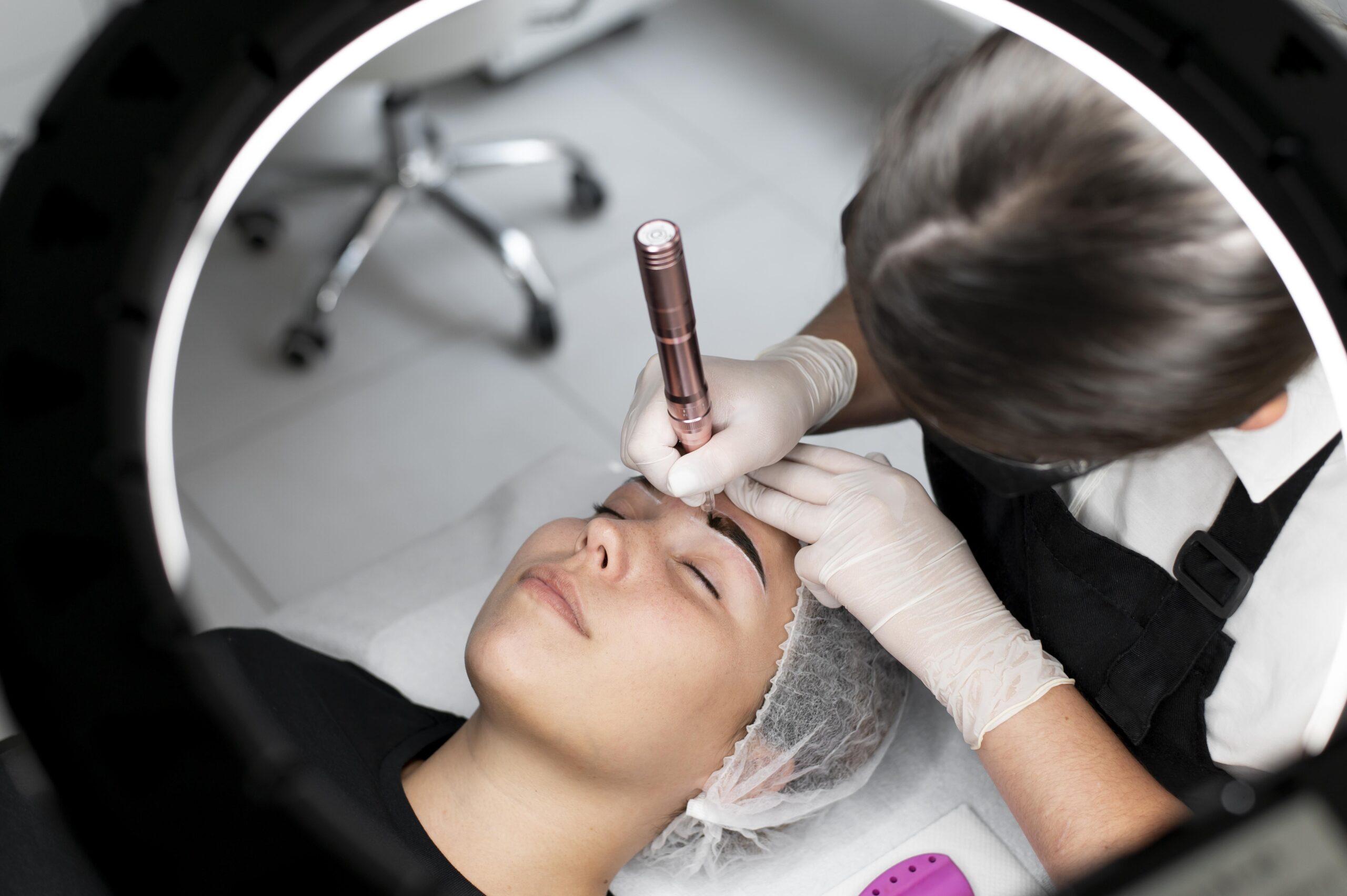 young-woman-going-through-microblading-treatment (1)